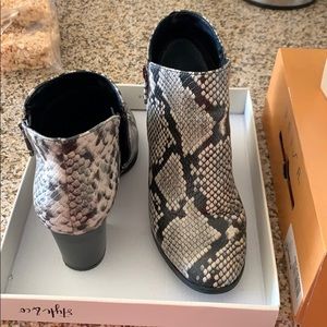 Snakeskin booties 👢